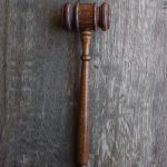 brown mallet on gray wooden surface