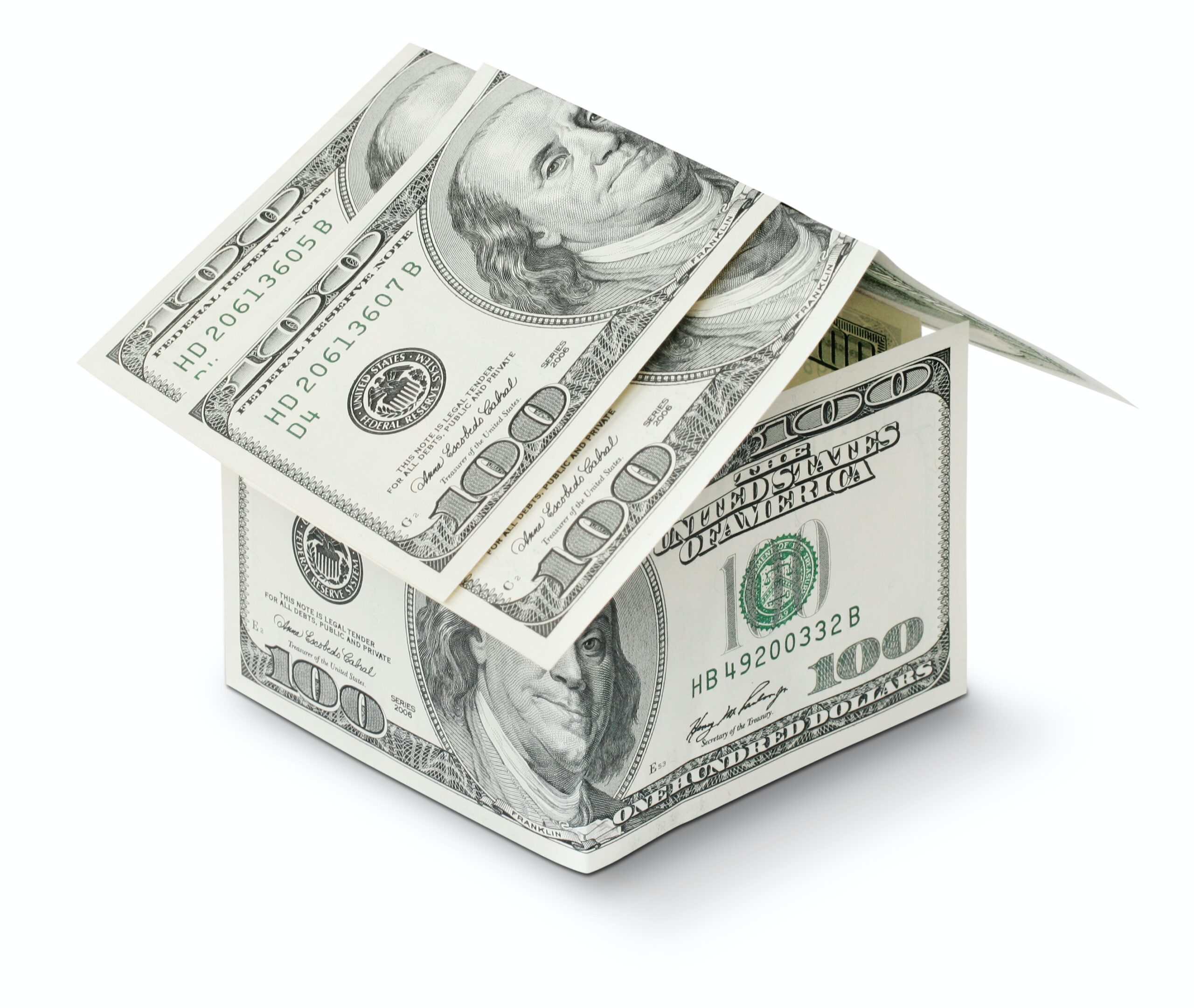 Symbolic house made from one hundred dollars isolated on white background