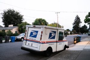 white and blue van on road during daytime